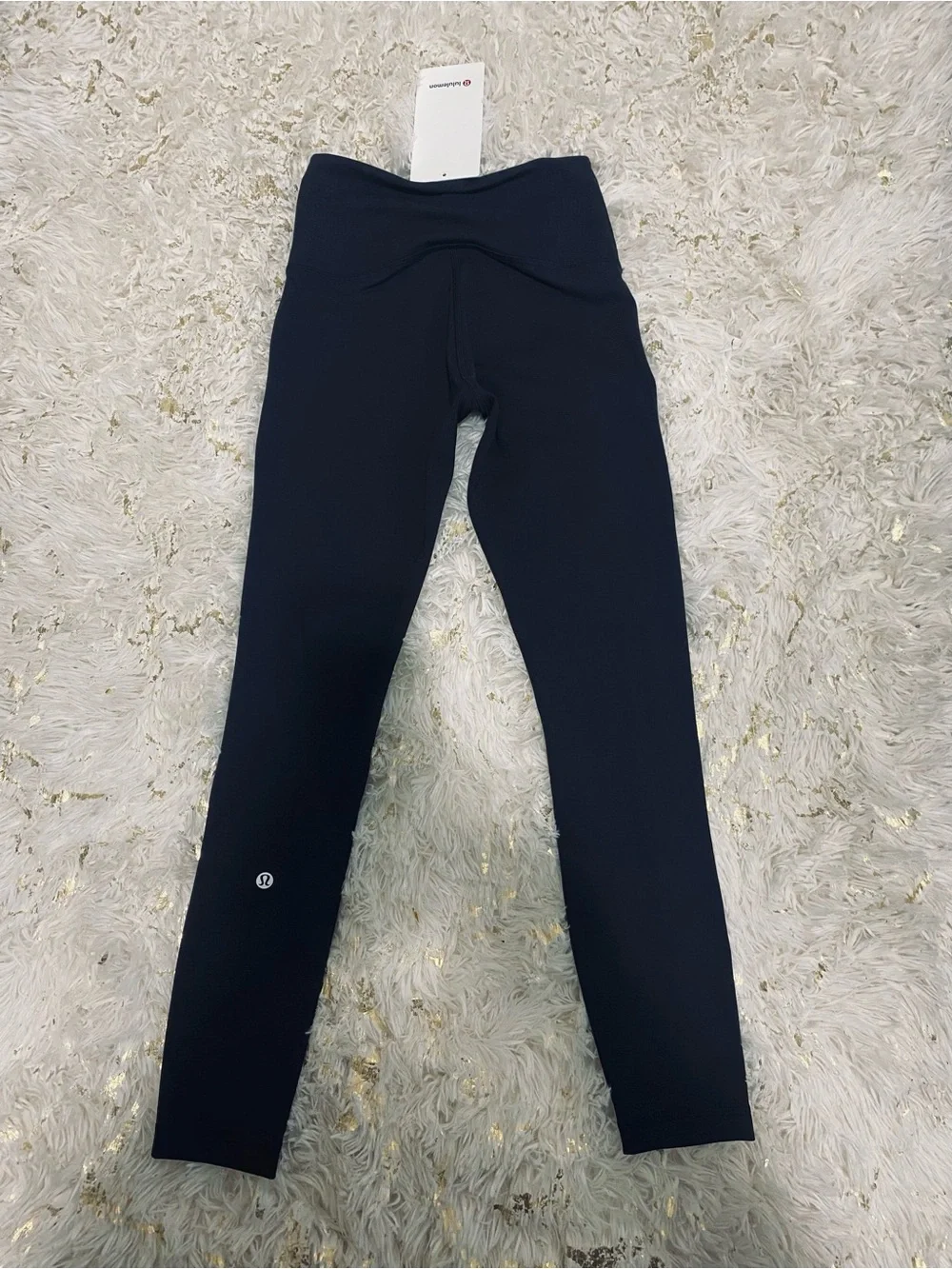 lululemon athletica Black Wunder Train High-Rise Tight 25". Size. 4 - Picture 14 of 14